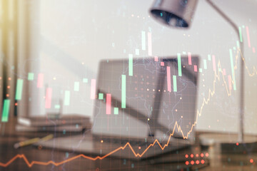 Multi exposure of abstract financial graph with world map on modern computer background, financial and trading concept