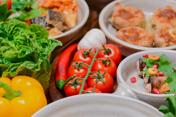 Very fresh tomatoes presented with fresh organic greenery. Vegetables, dill, parsley.