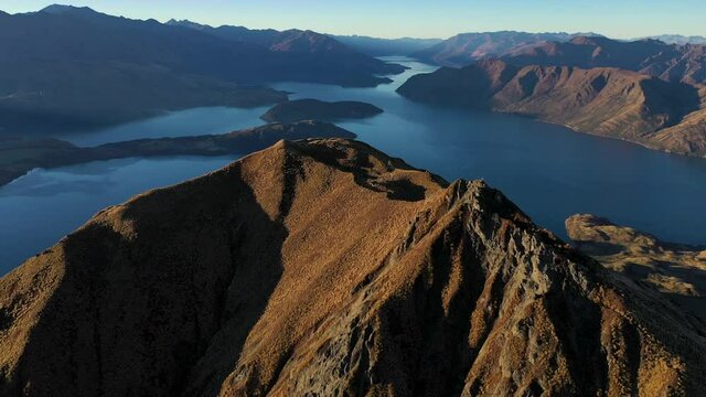 revealing drone shot  Roy's Peak New Zealand  Wanaka and Glendhu Bay