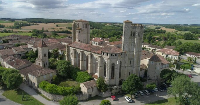 La Romieu aerial back travelling, Gers, labelled Les Plus Beaux Villages de France
