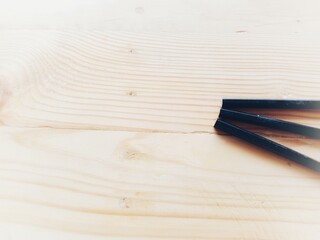 Group of colorful wooden pencils on wooden background. Idea concept for education about drawing and writing.  
