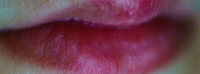 Macro photography of teenager's lips. Beauty concept. Modern fashion style of youth.