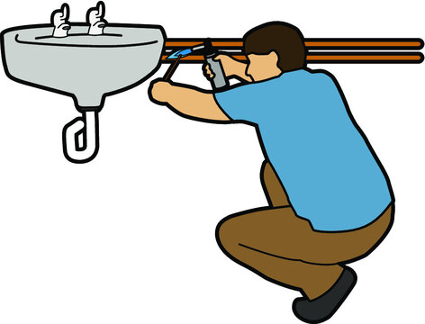 man welding sink pipe