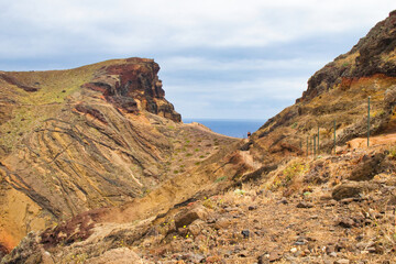 Naklejka premium The magnificent dramatic landscape with the red desert dunes on the Ponta de São Lourenço (Saint Lourence cape) on Madeira island