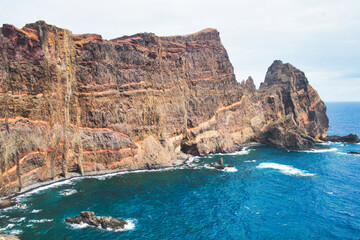 Fototapeta na wymiar The magnificent dramatic landscape with rocky coastline and stormy Atlantic ocean on the Ponta de São Lourenço (Saint Lourence cape), Madeira island
