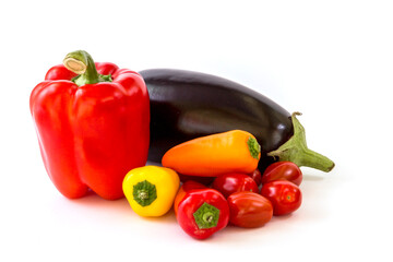Healthy food, vegetable, paprika, tomatos and eggplant on a white background