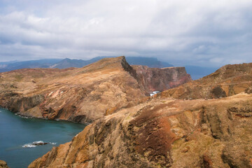 Fototapeta na wymiar The magnificent dramatic landscape with the red desert dunes on the Ponta de São Lourenço (Saint Lourence cape) on Madeira island