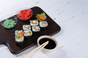 Sushi roll set with salad and fried shrimp