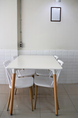 Naklejka na ściany i meble Interior classic wooden table and chairs