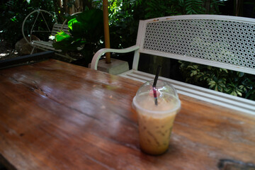 Iced coffee drink in resort garden