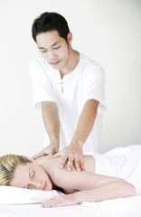 Obraz na płótnie Canvas Woman enjoying a body massage