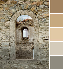 Attractive architectural ornaments, arch of window on stone wall in brown beige grey, ruins of...