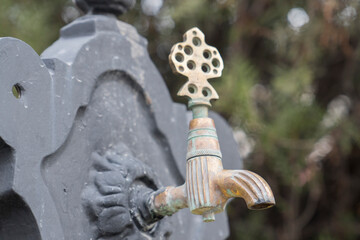 Blurred background old brass faucet 