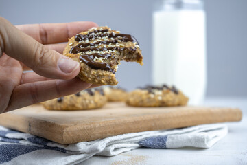 healthy banana oatmeal cookies with chocolate, healthy dessert with milk for breakfast