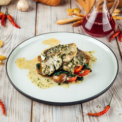 Pike-perch fish fillet with spinach creamy sauce