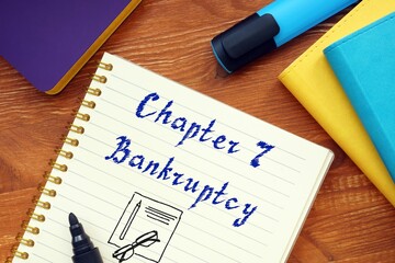 Business concept about Chapter 7 Bankruptcy with inscription on the sheet.