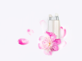 Natural cosmetic. Cream and peony flower in a bath with milk. Gentle care. Conceptual photo: the best cosmetic tool for body and face care.