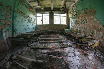 Fototapeta na wymiar School classroom in Prypiat, Chernobyl exclusion Zone. Chernobyl Nuclear Power Plant Zone of Alienation in Ukraine