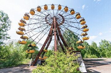 Fun fair, ferris wheel in Prypiat, Chernobyl exclusion Zone. Chernobyl Nuclear Power Plant Zone of...