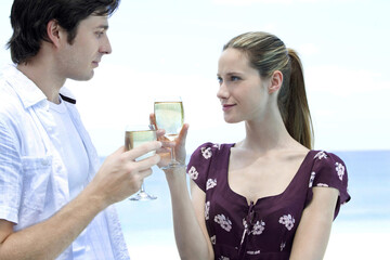 Man and woman drinking champagne