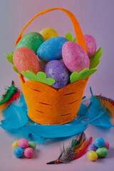 Colourful Easter eggs in a basket.