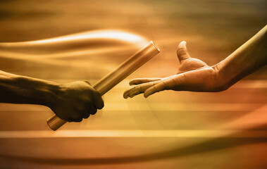 Two men passing golden baton in stadium - Powered by Adobe