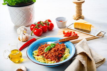 Delicious spaghetti bolognese on white background