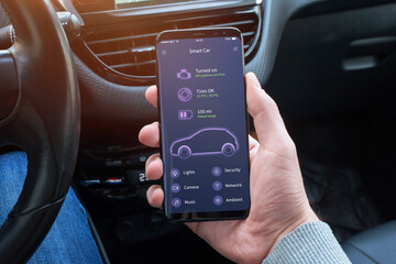 Information of electric or hybrid car battery condition on the mobile app driver hands. Modern app...