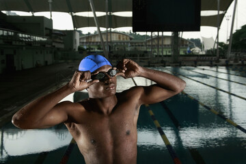 Man adjusting his goggles