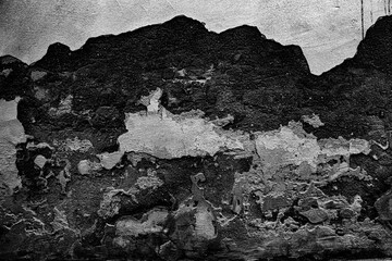 Gray colored abstract wall background with textures of different shades of grey