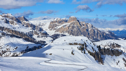 Snowy winter mountains panoramic landscape in the Dolomites Alps in Italy.