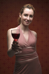 Woman with a glass of red wine