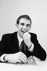 Businessman counting banknotes