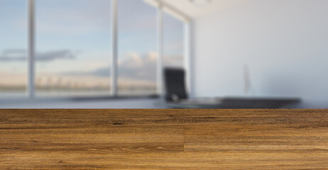 blurred interior on a wooden table background.Head office with a large window. modern furniture.. 3D rendering