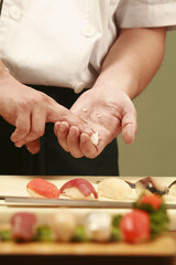 Chef preparing sushi