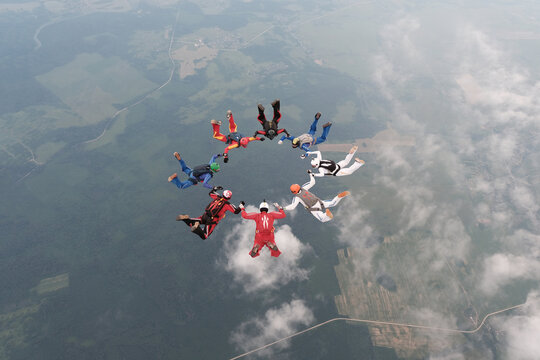 Skydiving. Formations. A group of skydivers is in the sky.