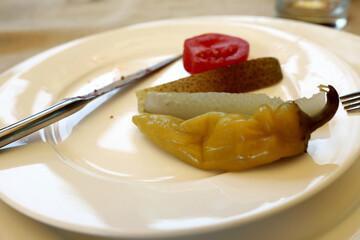 Pickled pepper with cucumber and tomato