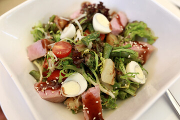 Tuna salad on white plate