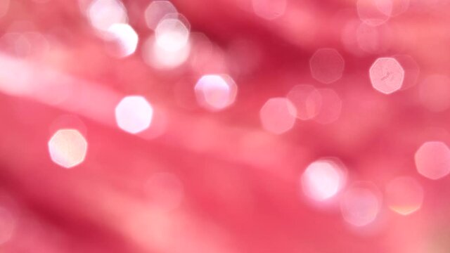 abstract bokeh background  white red color heptagon snape / bright water drop on red leaf