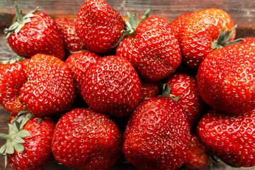 fresh organic strawberries close-up background. Organic food delivery. Packaging of organic strawberries..