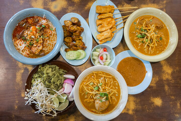 Northern Style Thai Food  background,Khao Soi Kai,Nam ngiao Rice Noodle,Northern Thai Sausage.