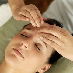 Fototapeta na wymiar Woman enjoying a head massage