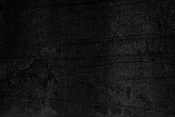 Black rough concrete background with scratch and crack and dirt
