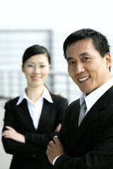 Business people smiling at the camera