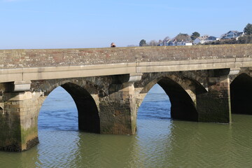 The ancient Long bridge spanning the Torridge River at Bideford, Devon, England.