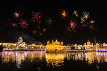 Golden Temple Amritsar lit by Diya and fire crackers Guru Purab festival and Diwali  - 362839026