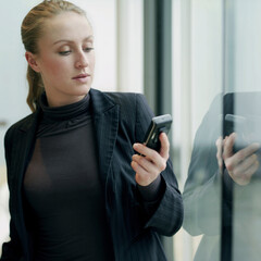 Business lady using cell phone