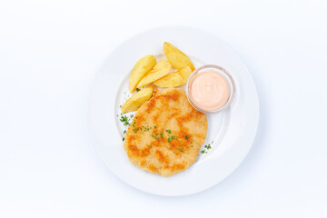 schnitzel with potatoes on white