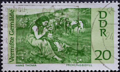 GERMANY, DDR - CIRCA 1967: a postage stamp from Germany, GDR showing missing painting: countryside Hans Thoma