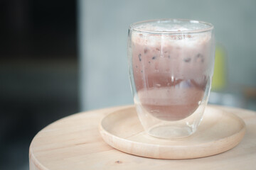 Iced coffee in double sided wall glass